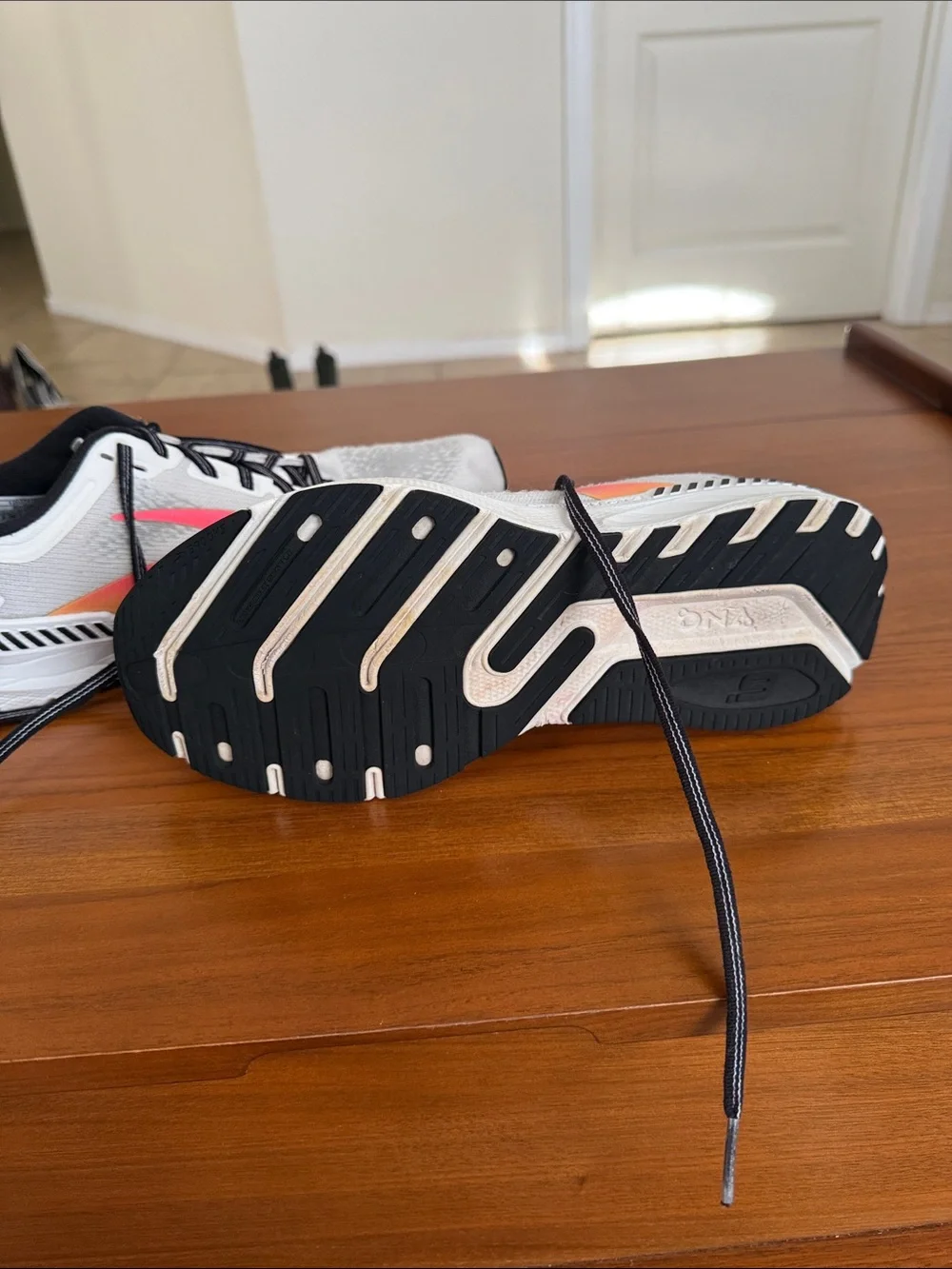 Brooks White Running Sneakers with Pink Accent and Black Trim